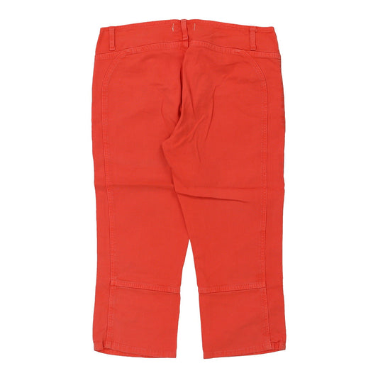 Vintage orange Benetton Shorts - womens 33" waist